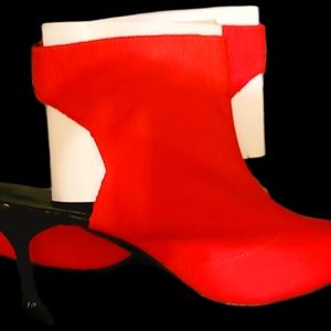 Red cloth black square stiletto heels.
